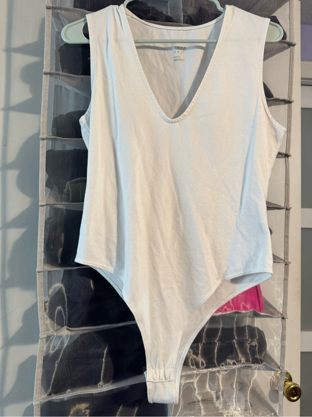a new day White Sleeveless V-Neck Bodysuit